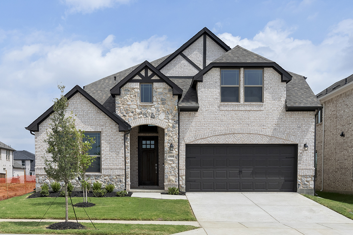 Inventory home at 4900 Pater in Celina, TX featuring a stone and brick front elevation, two-car garage, and located in Prosper ISD.
