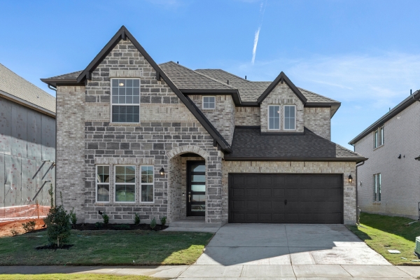 Garland floor plan at 5530 Burford Lane showing a two‑story layout with first‑floor primary suite, open family room, kitchen and breakfast area, upstairs game room, and multiple optional bedroom and bath configurations.